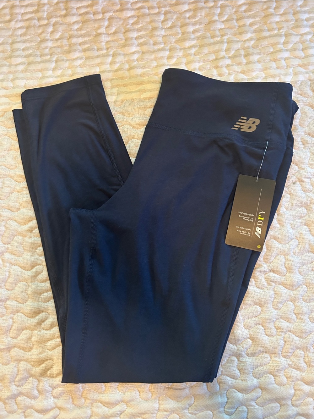 New Balance women's leggings in a dark navy blue